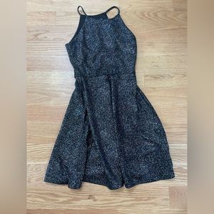 Size small dress. High neck front and back. Very sparkly.